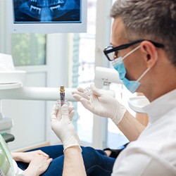 Woman listening to dentist during consultation