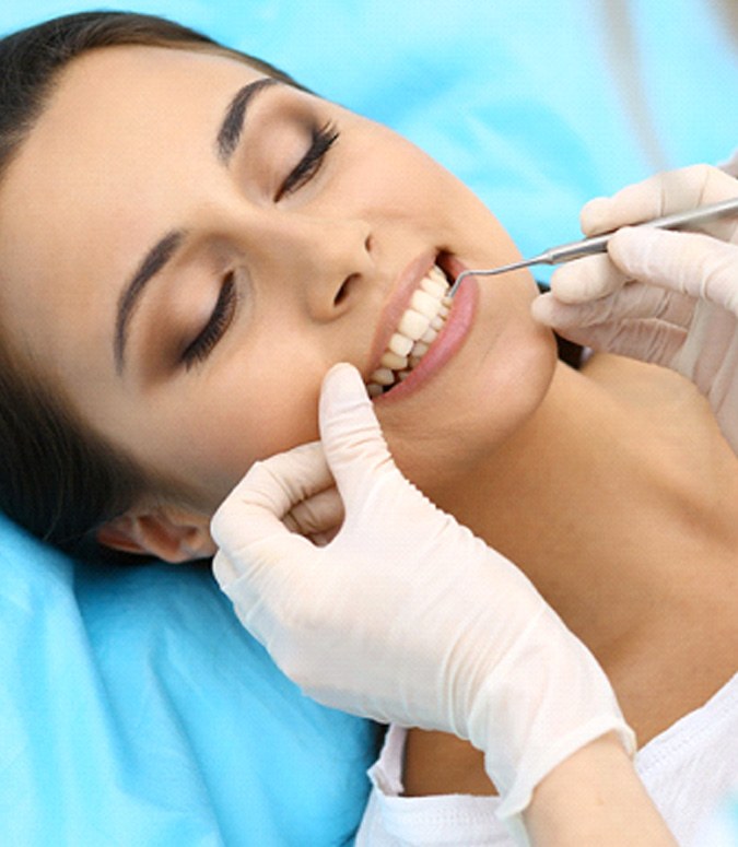 Woman at dentist for dental cleaning