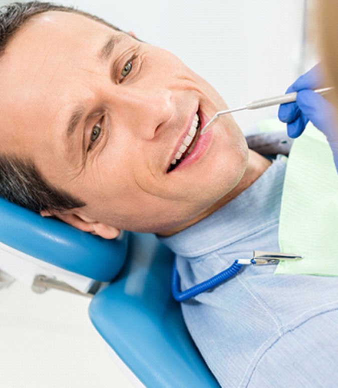 Man at dentist for dental checkup