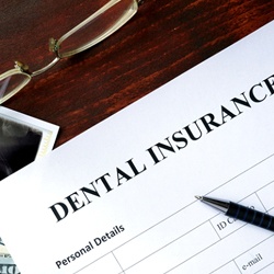 dental insurance form on table