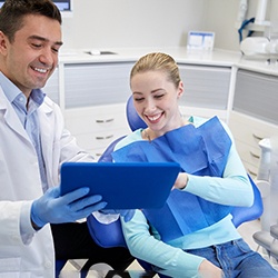 A woman receiving a dental checkup from her dentist 