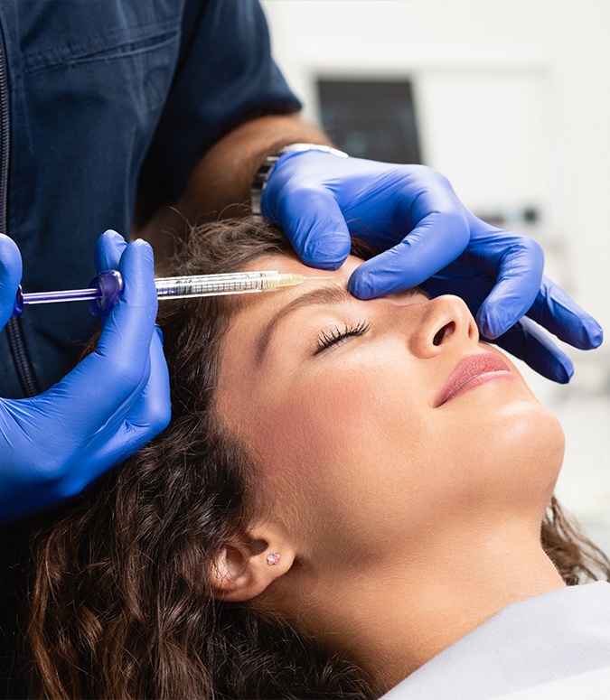 Woman receiving Botox treatment