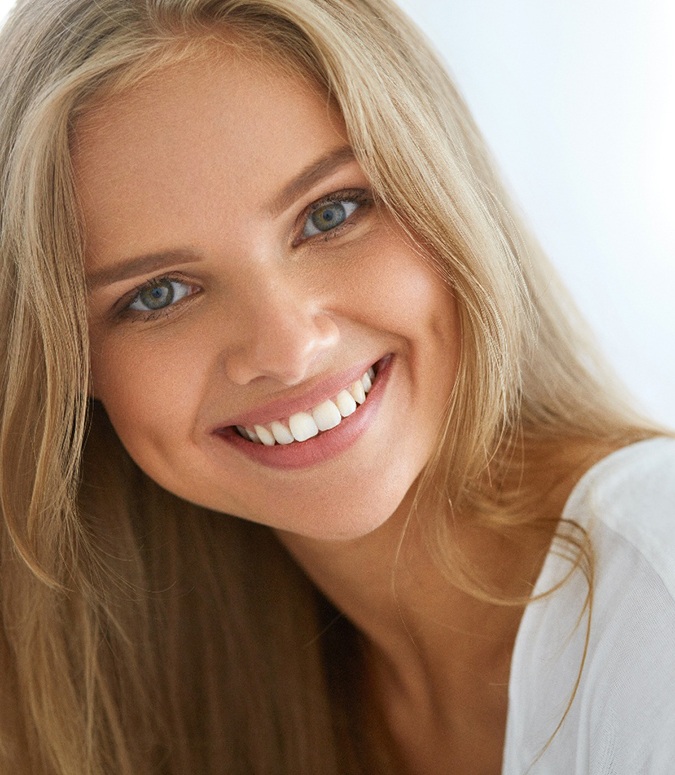 closeup of woman smiling after teeth whitening in Englewood