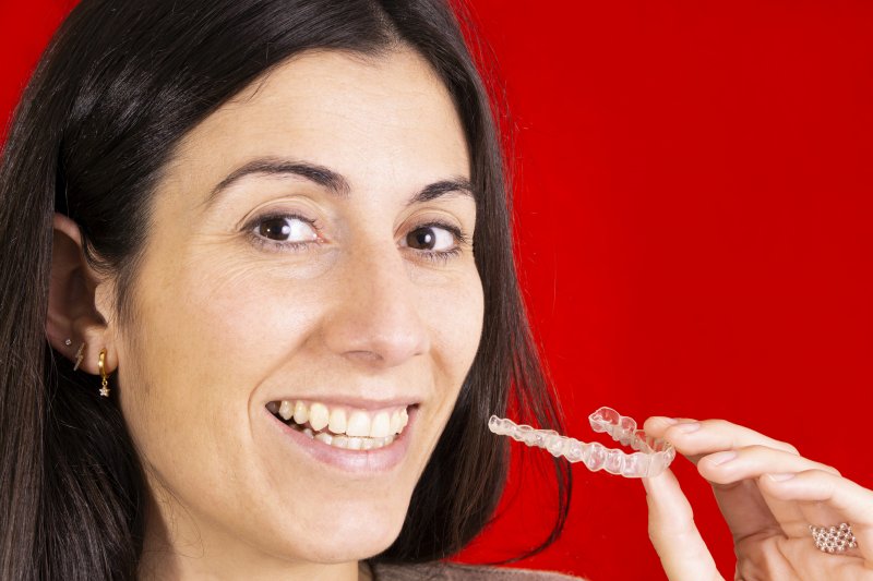 Woman with Invisalign after braces