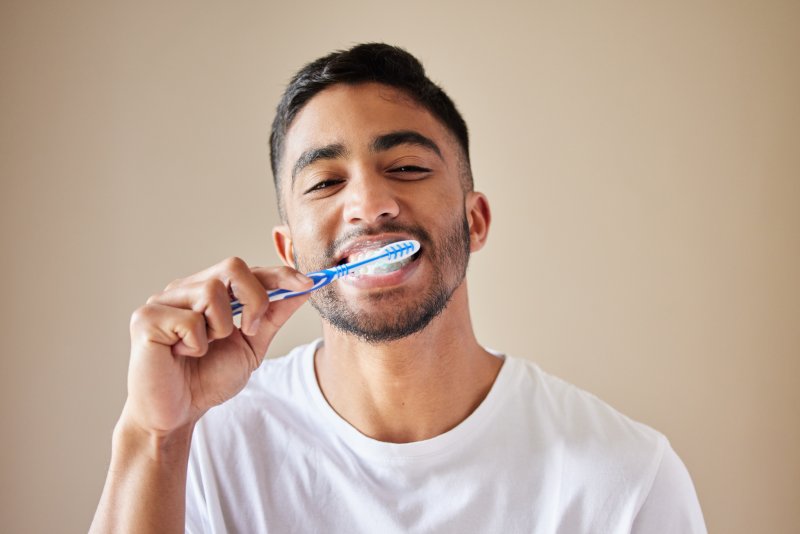 Man brushing his teeth