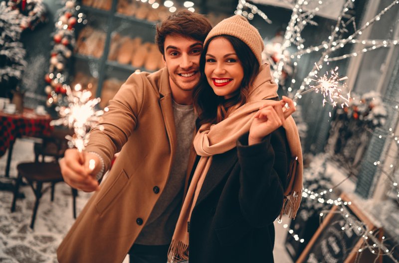 a couple smiling about New Year’s resolutions in Englewood